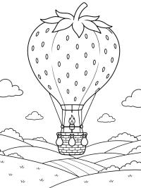 Erdbeer-Hei&szlig;luftballon &uuml;ber dem Land